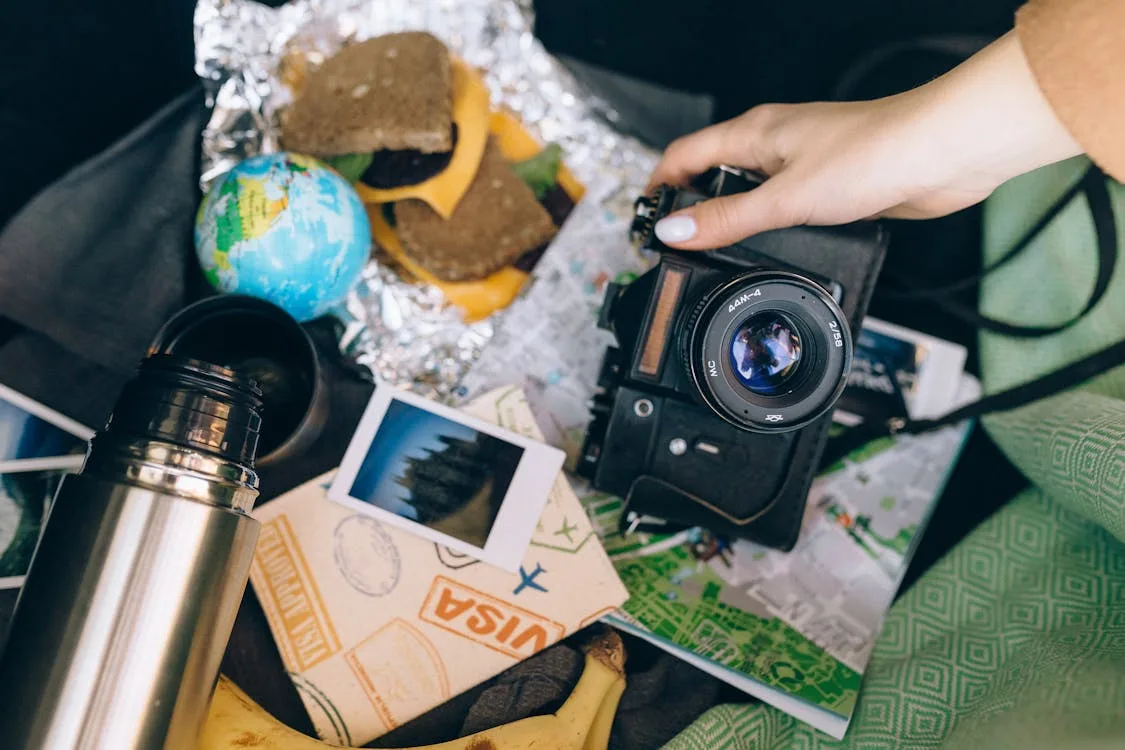 Traveler with multiple visa stamps and documents